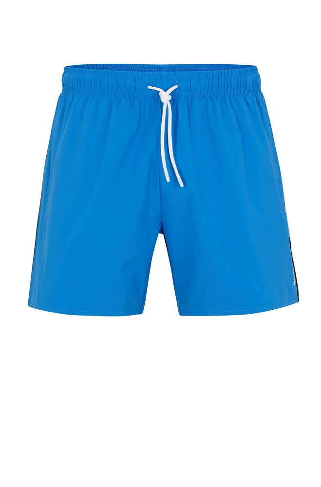 Swim shorts with signature stripe and logo