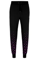 BOSS x Khaby Relaxed-fit cotton-blend tracksuit bottoms with gradient monograms