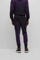 BOSS x Khaby Relaxed-fit cotton-blend tracksuit bottoms with gradient monograms