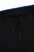 Cotton-blend tracksuit bottoms with side-stripe tape