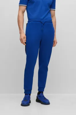 Cotton-blend tracksuit bottoms with side-stripe tape