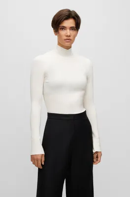 High-neck sweater a ribbed knit