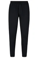 Cuffed tracksuit bottoms active-stretch fabric