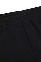 Cuffed tracksuit bottoms active-stretch fabric