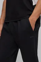 Cuffed tracksuit bottoms active-stretch fabric