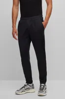 Cuffed tracksuit bottoms active-stretch fabric