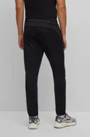 Cuffed tracksuit bottoms active-stretch fabric