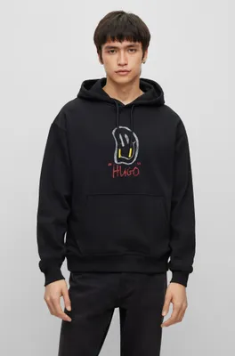 Relaxed-fit cotton hoodie with doodle motifs