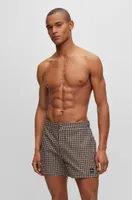 Quick-drying swim shorts with hounstooth pattern