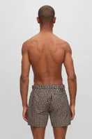 Quick-drying swim shorts with hounstooth pattern