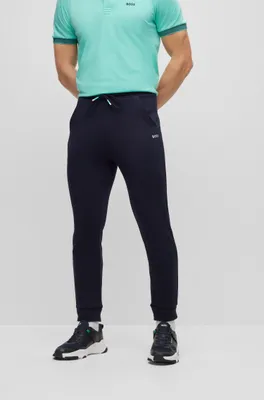 Regular-fit tracksuit bottoms with multi-colored logos