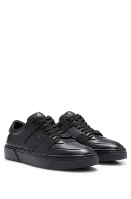 Leather lace-up trainers with monogram detailing