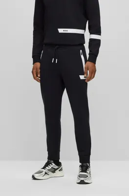 Cotton-blend tracksuit bottoms with logo stripe