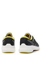 Mixed-material trainers with rubberized faux leather