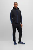Mixed-material trainers with rubberized faux leather
