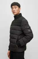 Water-repellent padded jacket with zip closure