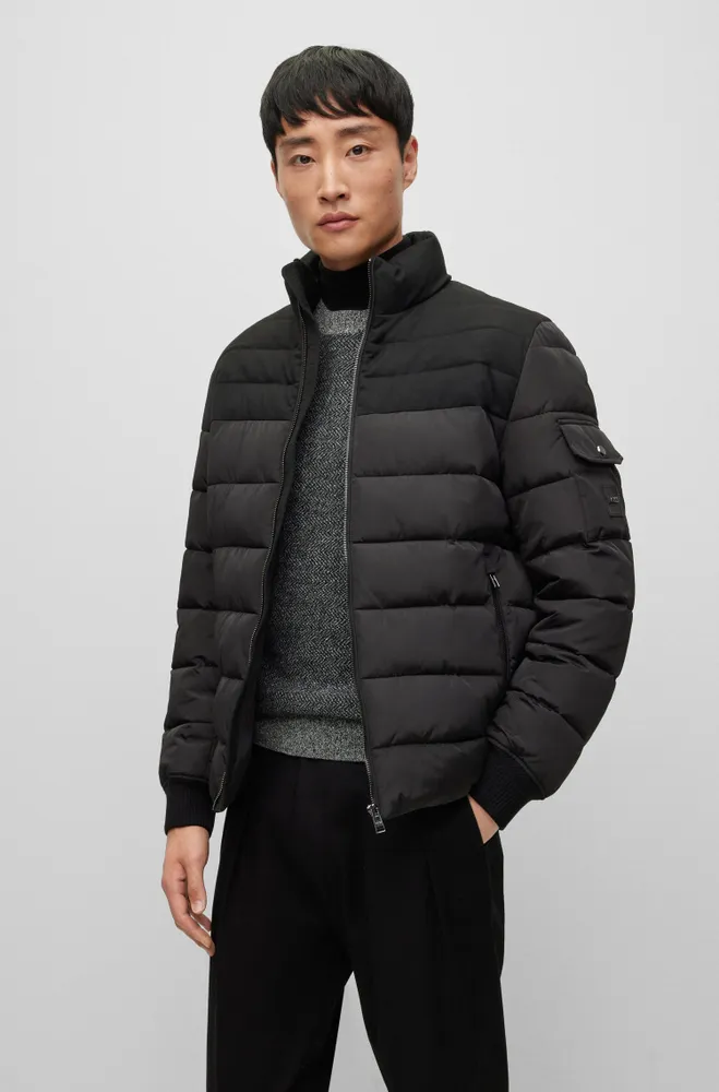 Water-repellent padded jacket with zip closure