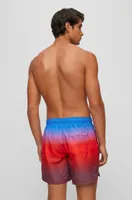 Logo-print swim shorts with degradé monogram pattern