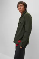 Oversize-fit overshirt with red logo label