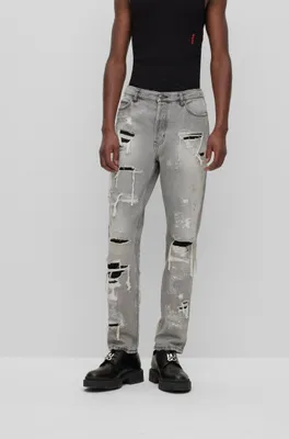 Tapered-fit jeans heavily distressed silver-gray denim
