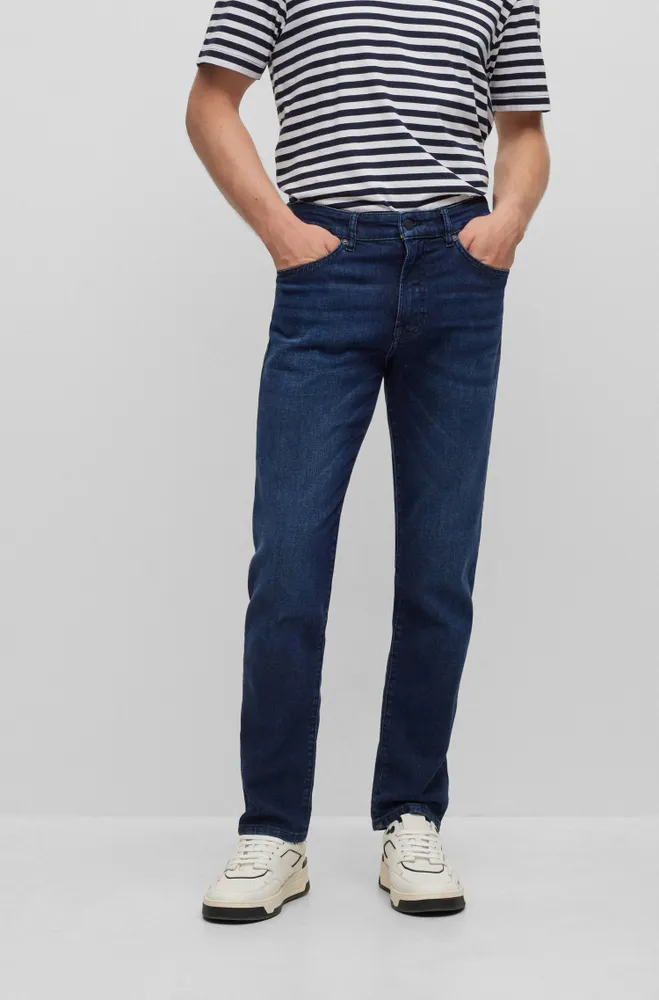 HUGO - Denim regular-fit jeans with stacked-logo jacquard