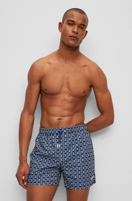 Recycled-material swim shorts with seasonal print