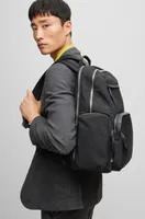 Structured-material backpack with logo and two-way zip