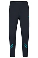 Regular-fit tracksuit bottoms with decorative reflective artwork