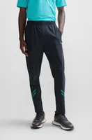 Regular-fit tracksuit bottoms with decorative reflective artwork