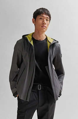 Water-repellent softshell jacket with logo badge