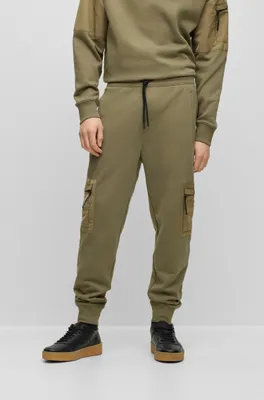 Relaxed-fit tracksuit bottoms with cargo pockets