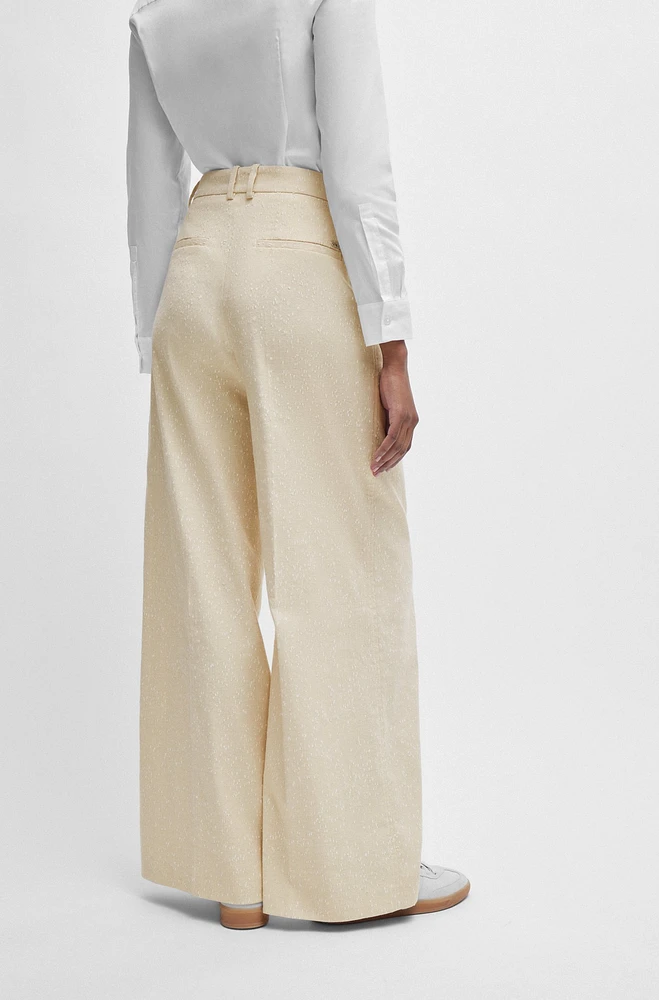 Relaxed-fit trousers a slub cotton blend