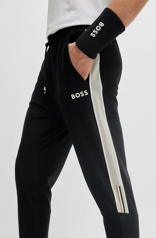 BOSS x Matteo Berrettini tracksuit bottoms with contrast tape and branding