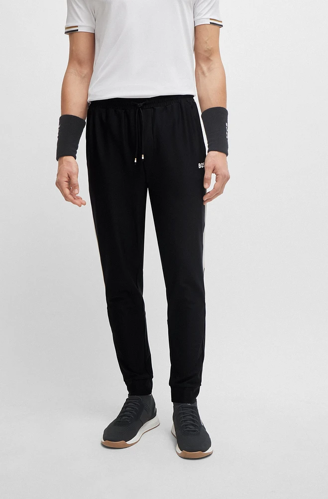 BOSS x Matteo Berrettini tracksuit bottoms with contrast tape and branding