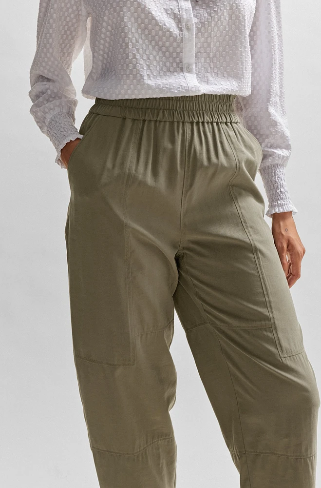 Pantalones regular fit con corte cónico