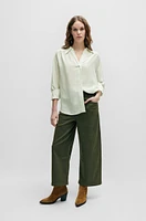 Relaxed-fit blouse with concealed placket and point collar