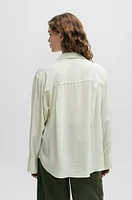 Relaxed-fit blouse with concealed placket and point collar