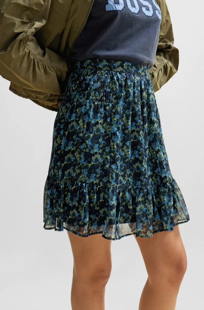 Seasonal-print mini skirt with volant hem