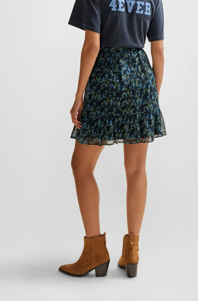 Seasonal-print mini skirt with volant hem