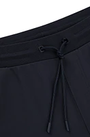 Regular-fit tracksuit bottoms with contrast piping