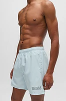 Fully lined swim shorts with logo print