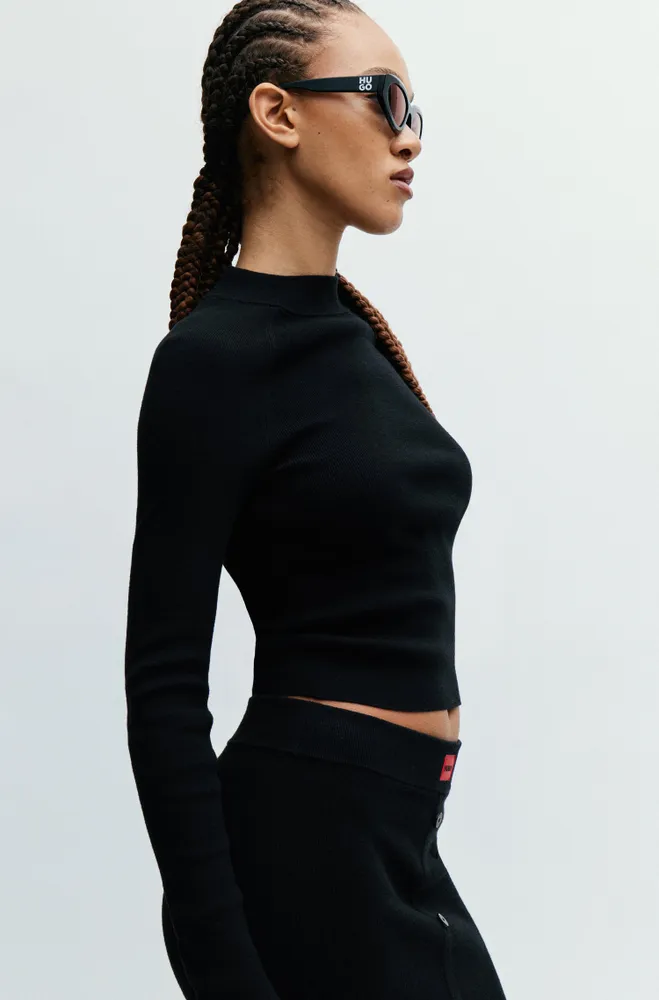 Rib-knit sweater with mock neckline and logo label