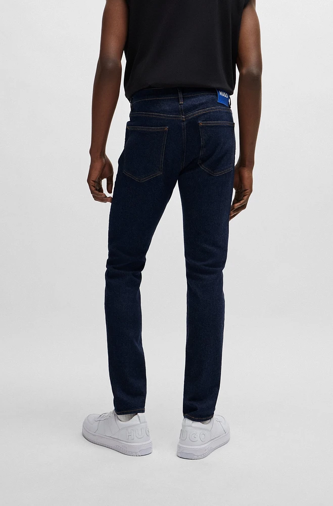 Vaqueros extra slim fit de denim elástico azul oscuro