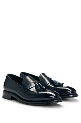 Italian-crafted leather loafers with tassel trim