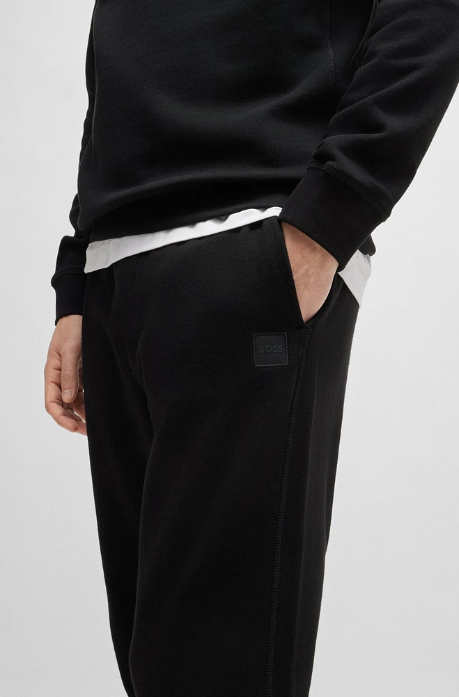 Cotton-terry tracksuit bottoms with logo patch