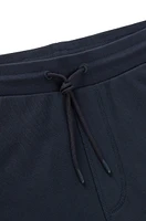 Pantalones de chándal en felpa algodón con parche logo