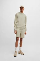 Cotton-terry relaxed-fit sweatshirt with logo patch