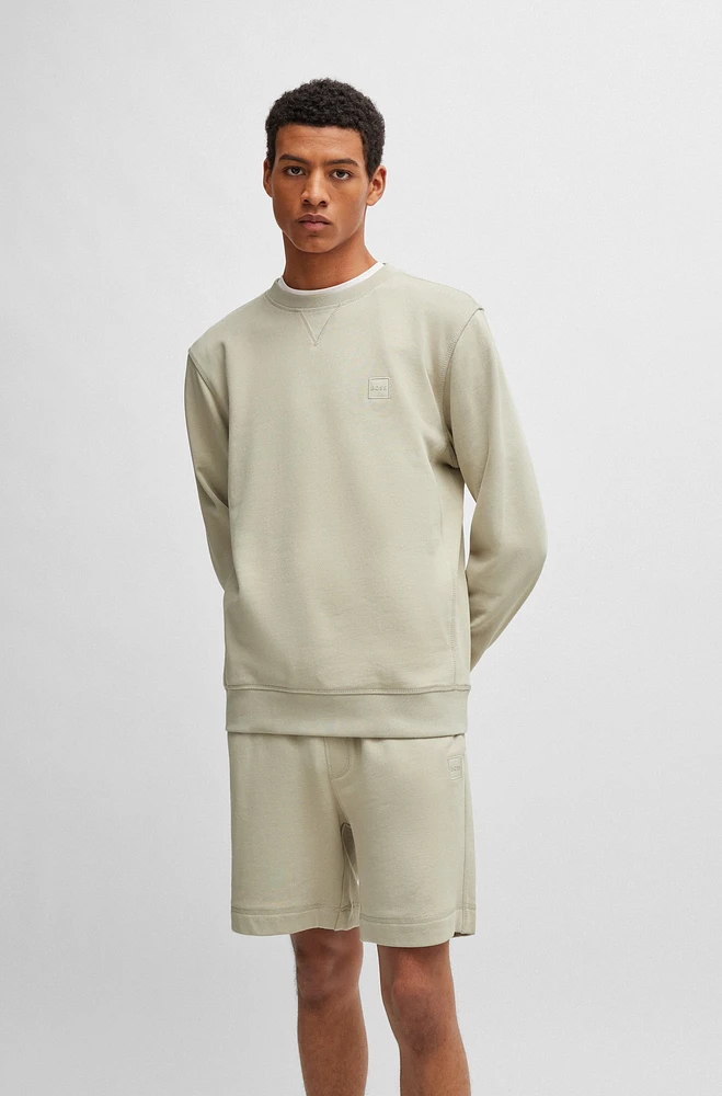 Cotton-terry relaxed-fit sweatshirt with logo patch