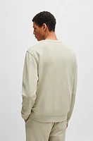 Cotton-terry relaxed-fit sweatshirt with logo patch