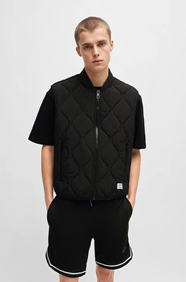 Water-repellent quilted gilet with logo patch